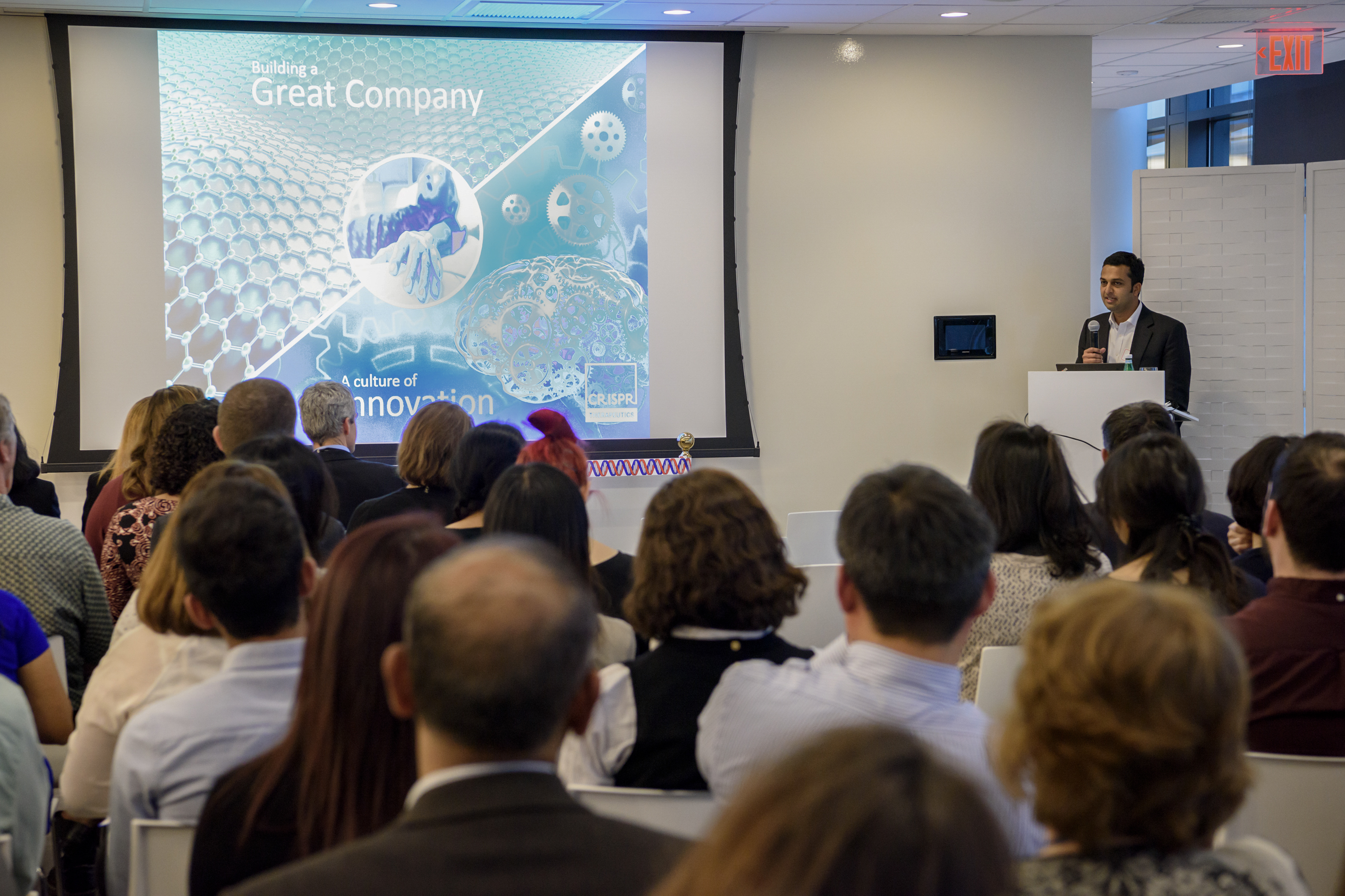 Samarth Kulkarni, CEO of CRISPR Therapeutics, speaks in front of employees at the opening of the company’s former office in Cambridge, Massachusetts in 2017.